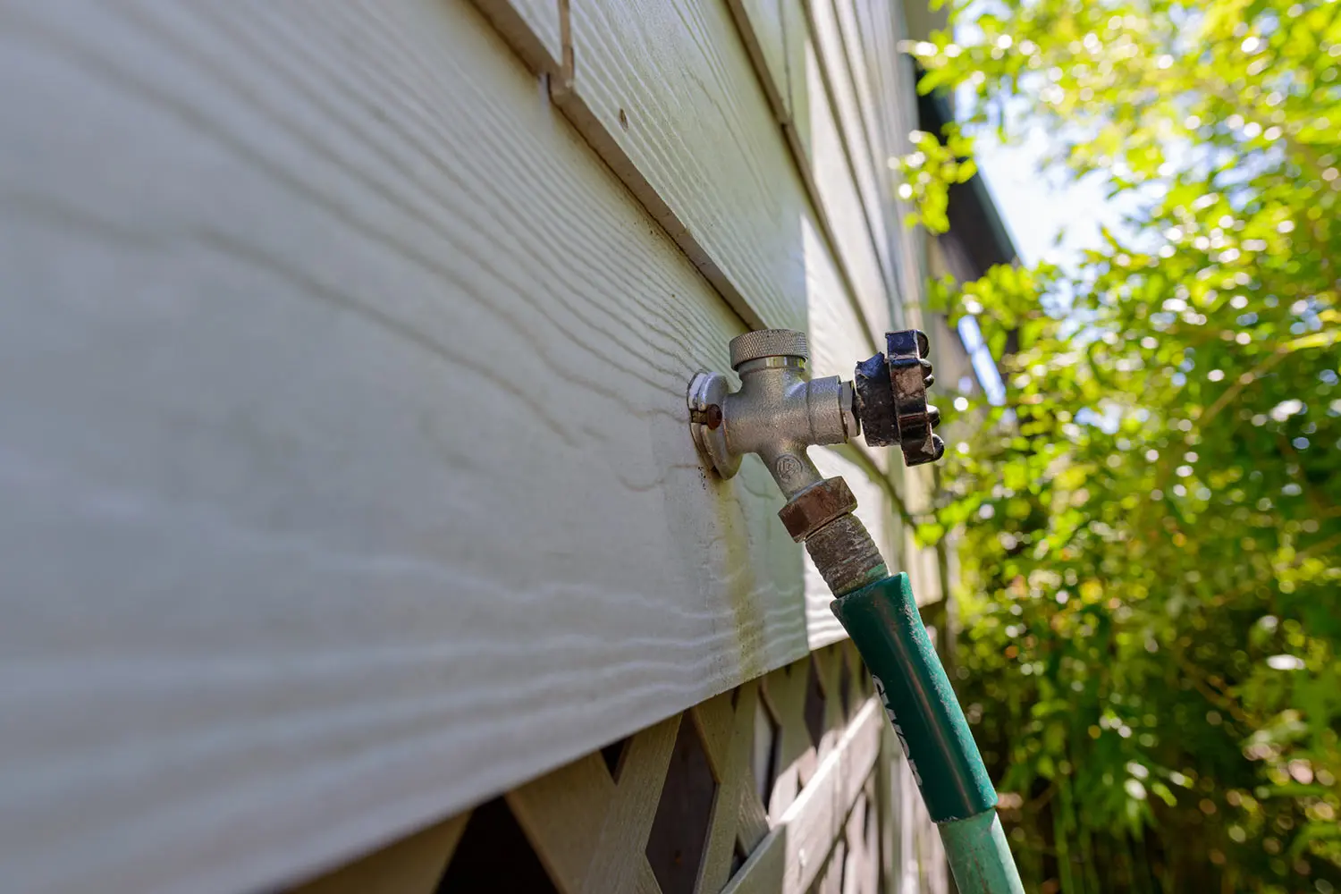 Outdoor tap on a Calgary home