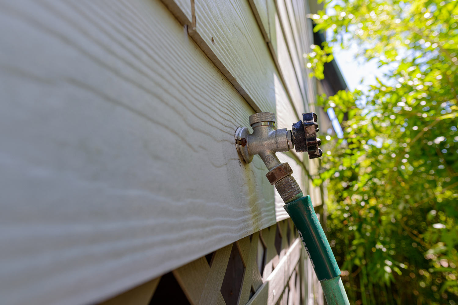 Outdoor tap on a Calgary home